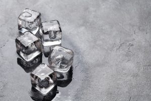 Treating Cheeks Pimples With Ice Cubes